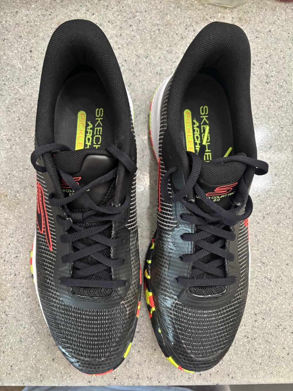 Skechers Men’s Black Athletic Sneakers with Red and Neon Yellow Accents
